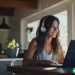 A confident young woman working from home as a virtual assistant.